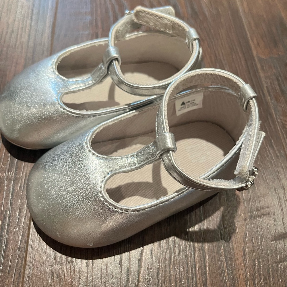 Baby GAP size 12-18 month silver flats.
